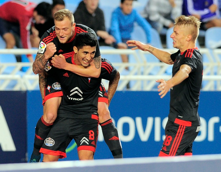 Guidetti double eases Celta past Cadiz