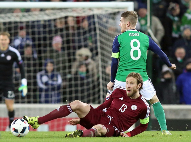 Davis sinks Lativa to keep Irish buoyant ahead of Euros